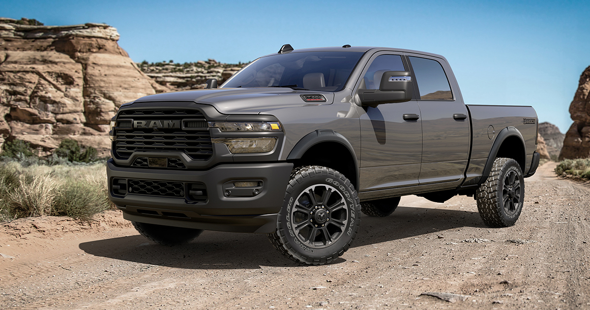 A Ram 2500 parked on a dirt road