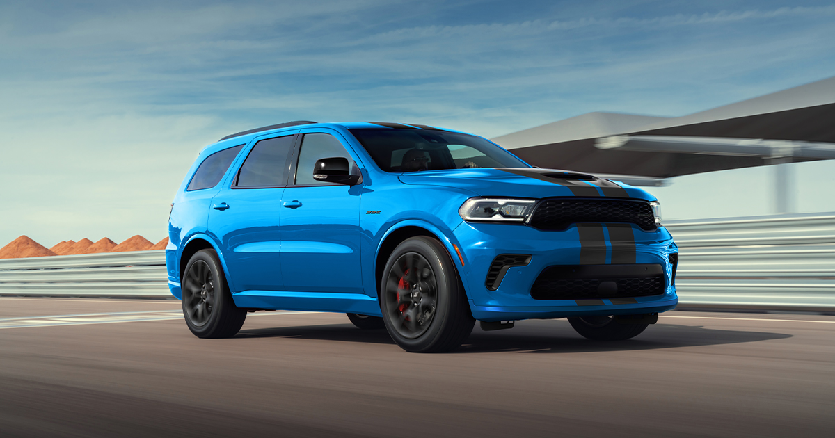 A blue Dodge Durango on the road.